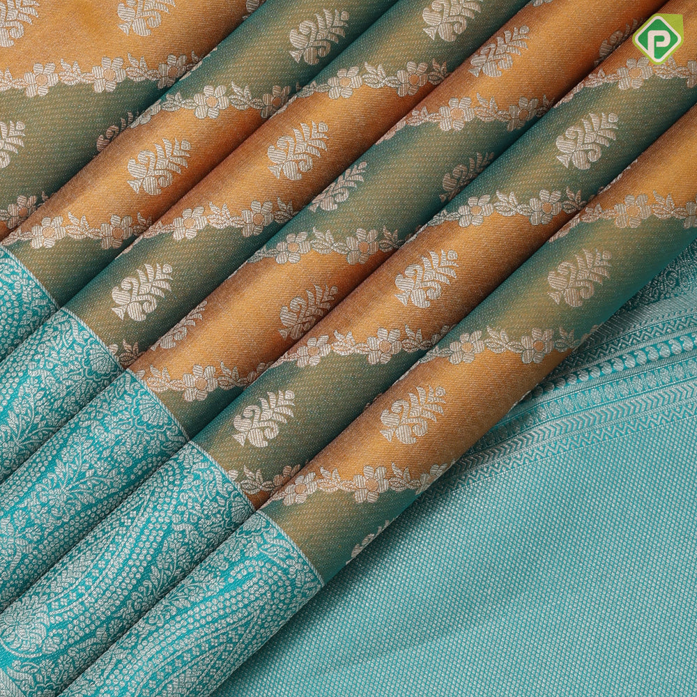 Golden yellow base silver gold zari grand floral creeper design sea green silver gold zari mango border Rangkat silk saree