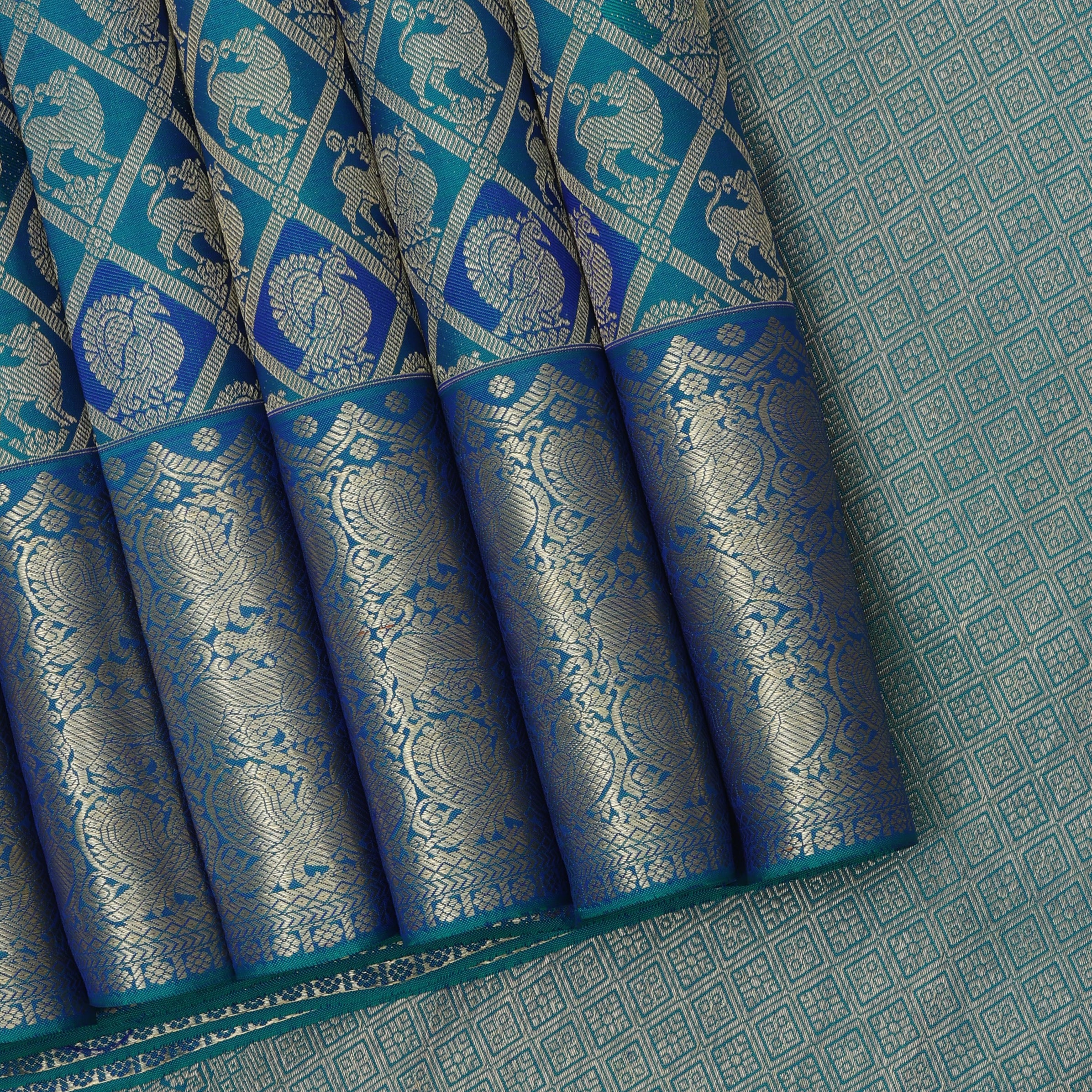 Peacok green blue combo gold zari annam and yaali butta self gold zari annam yaali butta border Grand bridal silk saree