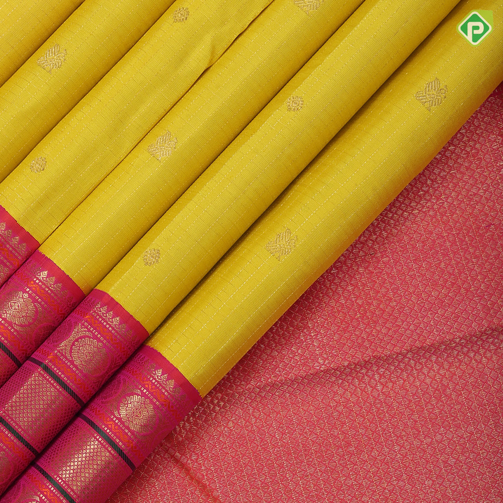 yellow base gold zari checked annam chakkaram butta contrast pink gold zari meena work lines border traditional silk saree