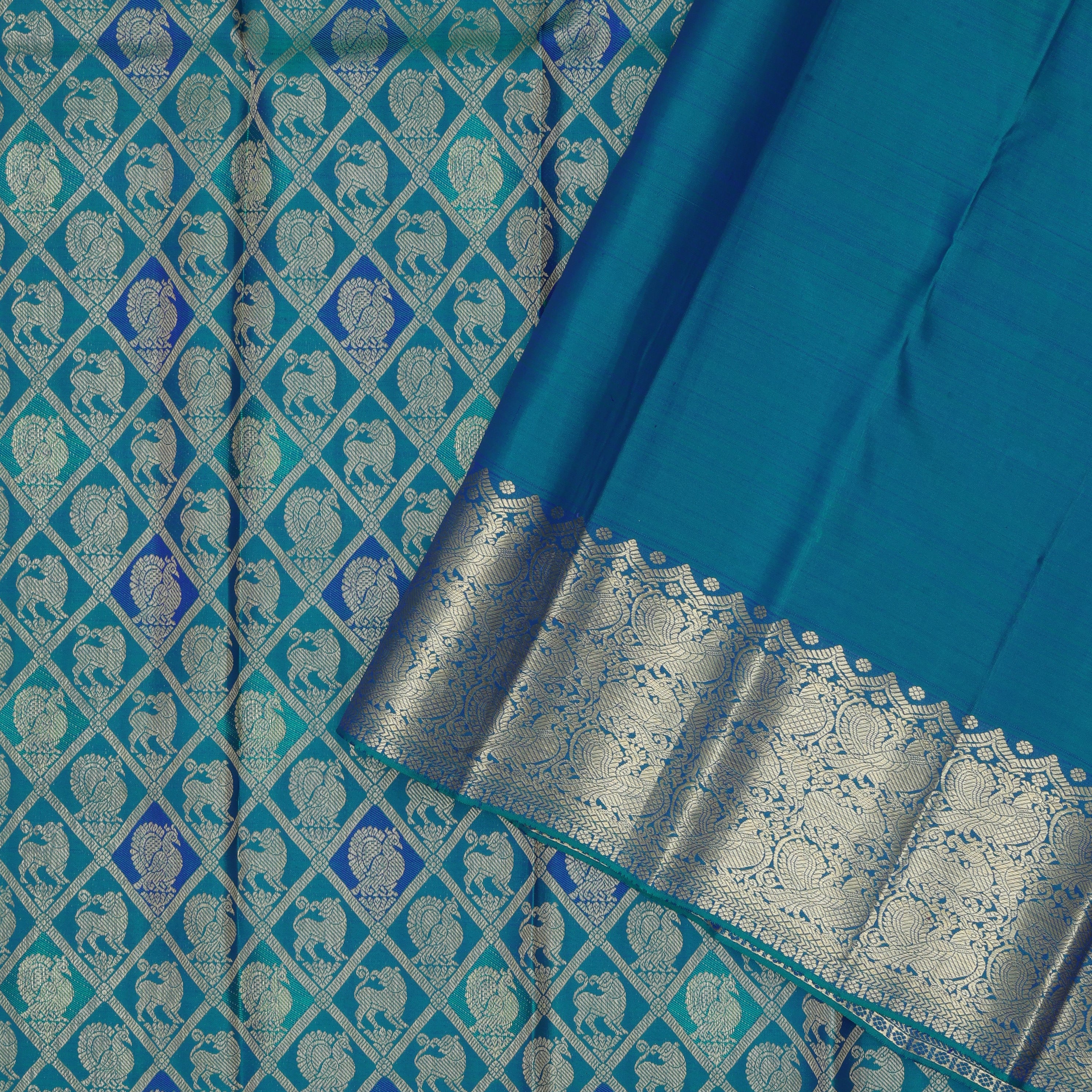 Peacok green blue combo gold zari annam and yaali butta self gold zari annam yaali butta border Grand bridal silk saree