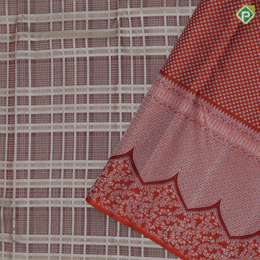 brown with beige silver zari checks window panel brick orange arch and floral design border trendy designer silk saree