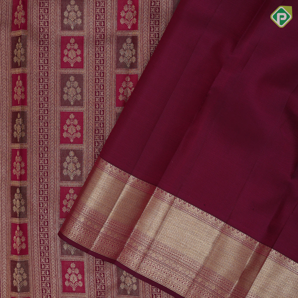 Purple base flower bunch in frame grand design self gold zari micro diamond border grand bridal silk saree