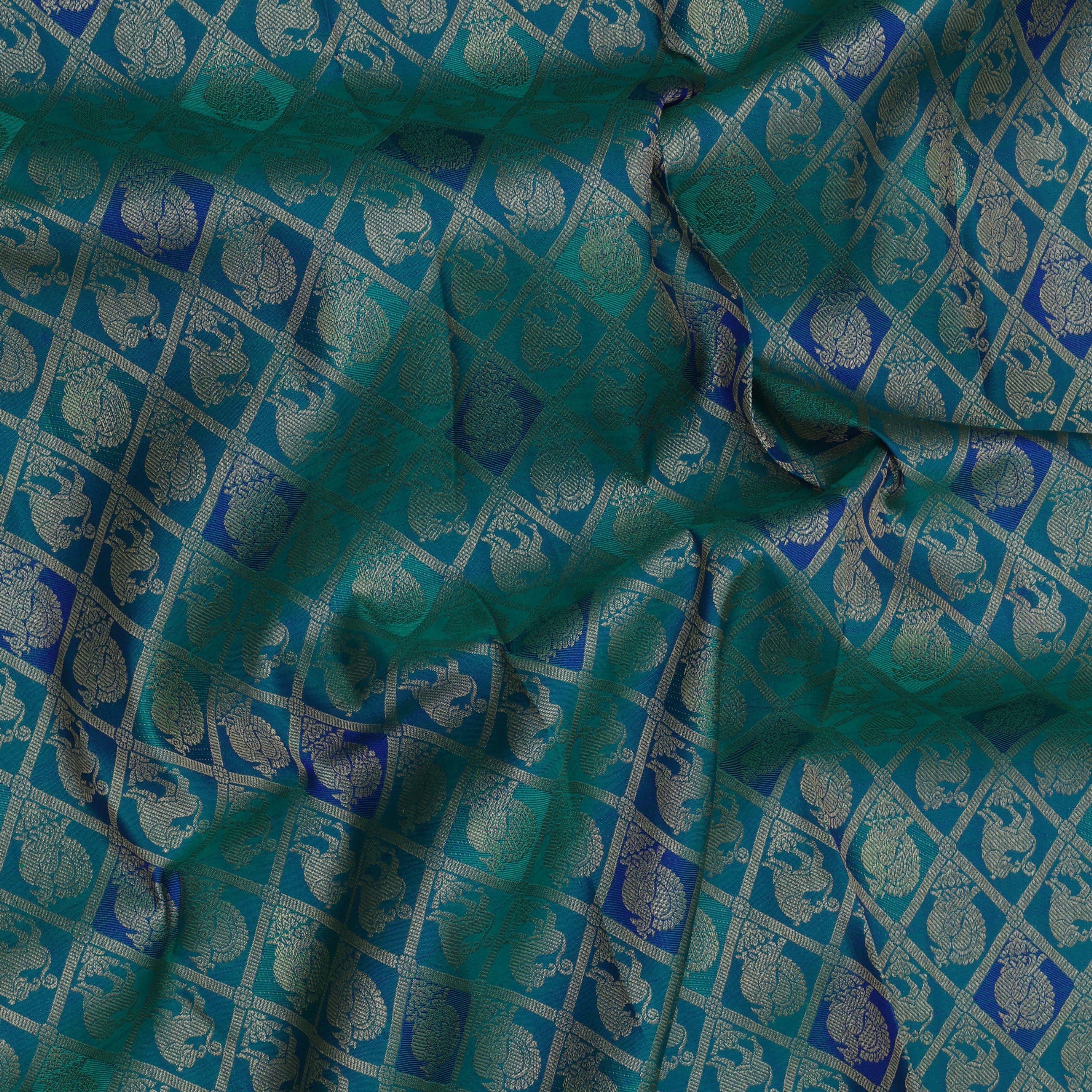 Peacok green blue combo gold zari annam and yaali butta self gold zari annam yaali butta border Grand bridal silk saree