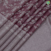 Onion pink and neem zari grand floral design self color and zari micro particles design border organza silk saree
