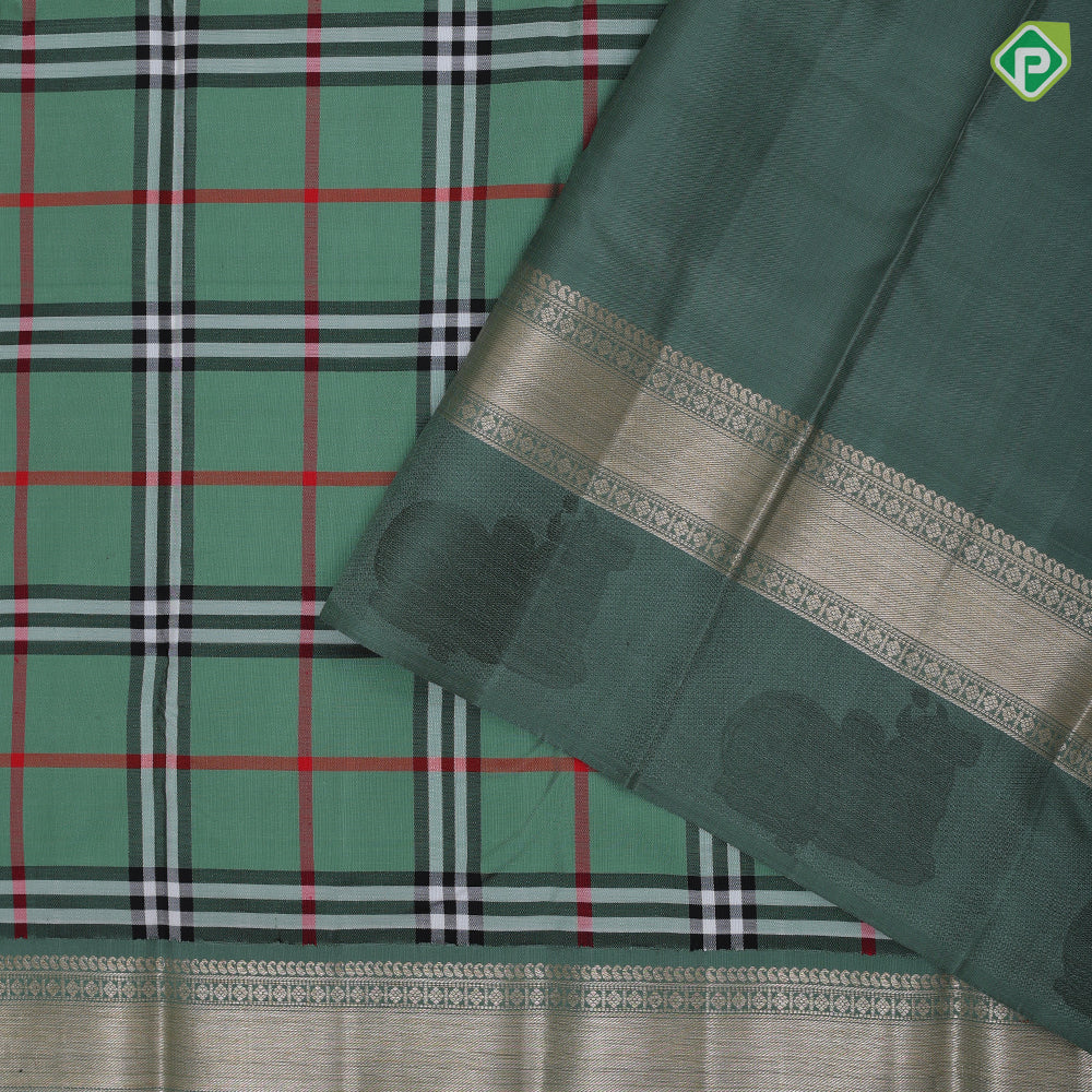 Sage green base multi color barbarian madras checks design self silver gold zari thread nandi butta border traditional silk saree