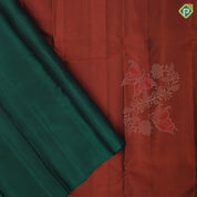 Rust color gold zari butterfly with flower creeper contrast green meena work border pure mix silk saree