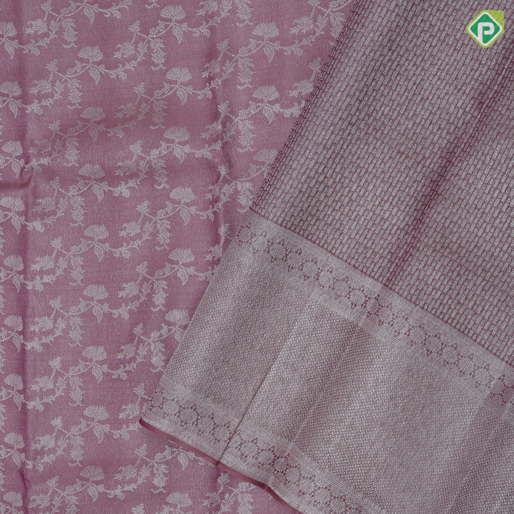 Onion pink and neem zari grand floral design self color and zari micro particles design border organza silk saree
