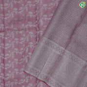 Onion pink and neem zari grand floral design self color and zari micro particles design border organza silk saree