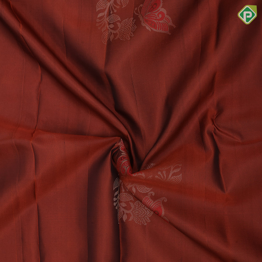 Rust color gold zari butterfly with flower creeper contrast green meena work border pure mix silk saree