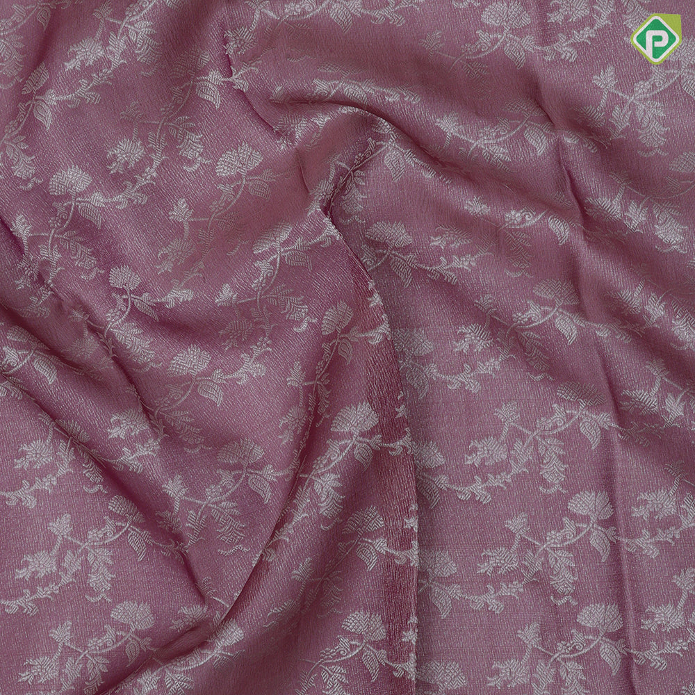 Onion pink and neem zari grand floral design self color and zari micro particles design border organza silk saree