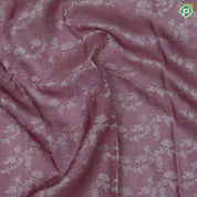 Onion pink and neem zari grand floral design self color and zari micro particles design border organza silk saree