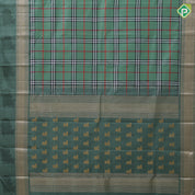 Sage green base multi color barbarian madras checks design self silver gold zari thread nandi butta border traditional silk saree