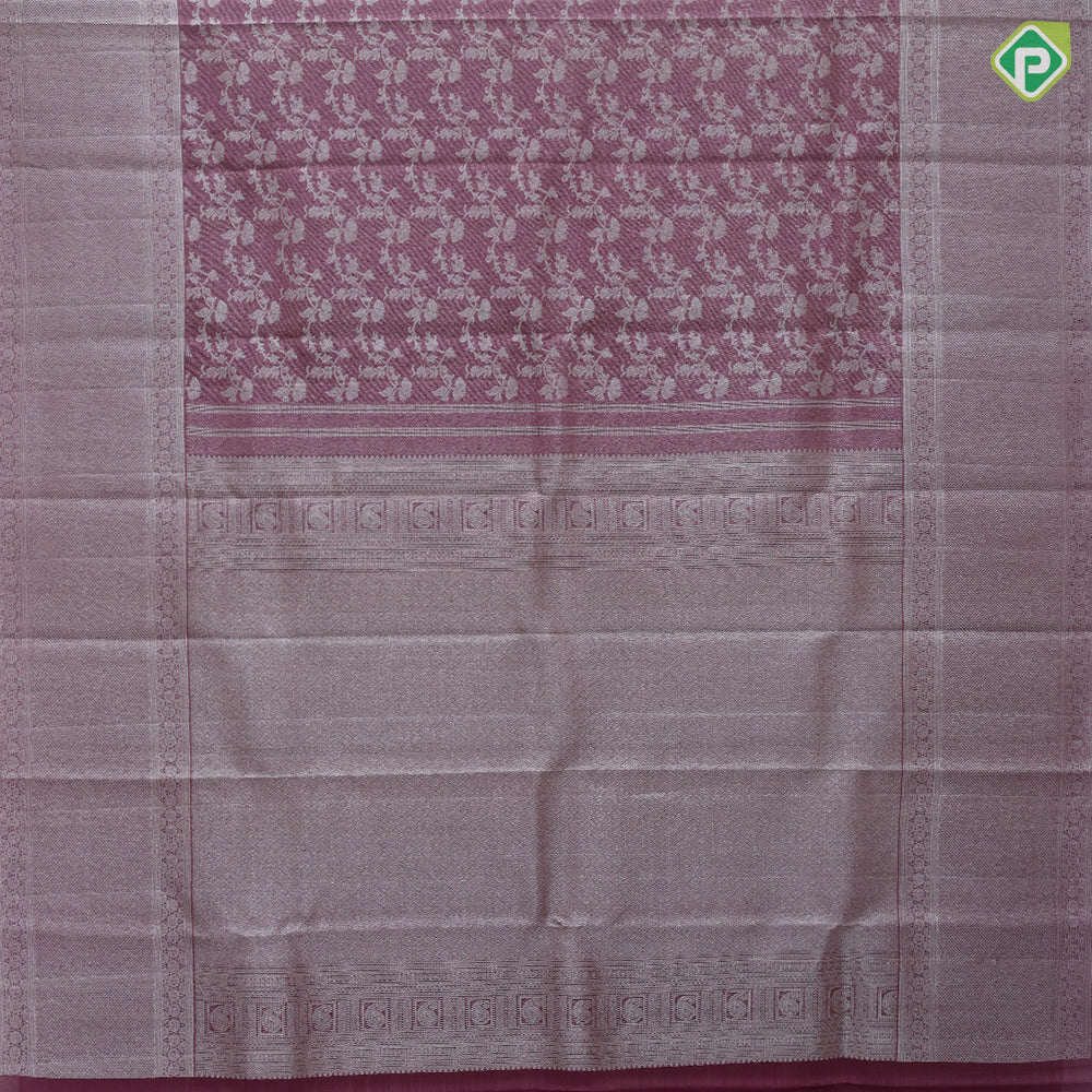 Onion pink and neem zari grand floral design self color and zari micro particles design border organza silk saree