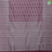 Onion pink and neem zari grand floral design self color and zari micro particles design border organza silk saree