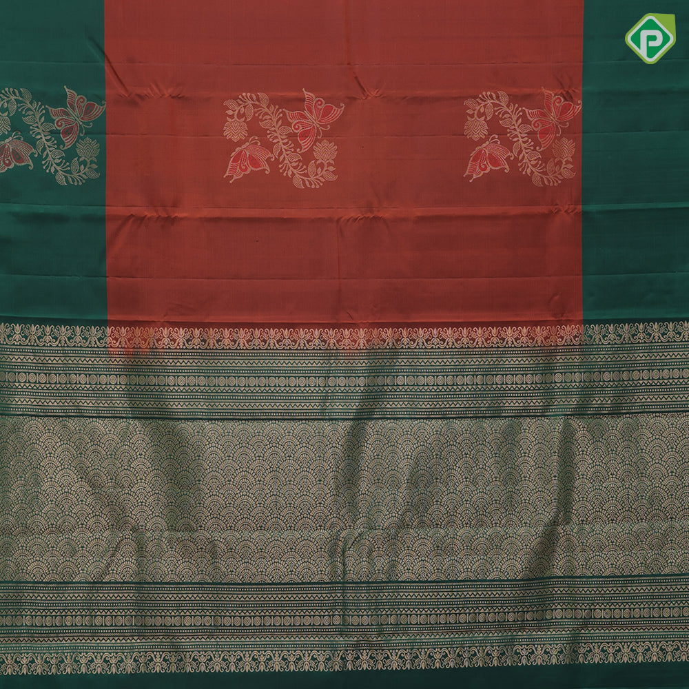 Rust color gold zari butterfly with flower creeper contrast green meena work border pure mix silk saree