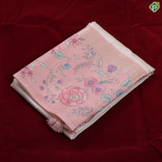 cream with gold zari round butta design baby pink multi colour floral border semi tusser saree