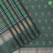 Sage green base multi color barbarian madras checks design self silver gold zari thread nandi butta border traditional silk saree