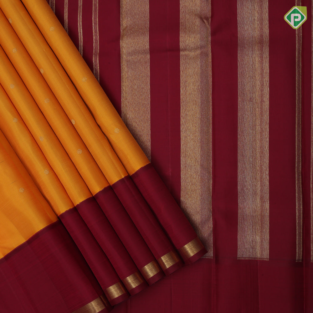 Mango yellow gold zari rudraksham butta design contrast maroon gold zari padded border traditional silk saree