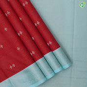 Tomato red gold zari lines and star butta design sky blue neem zari rangoli border art silk saree