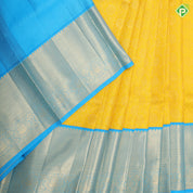 mango yellow gold zari grand floral design deep sky blue gold zari micro diamond border pattu paavadai thavani  3 in 1 set