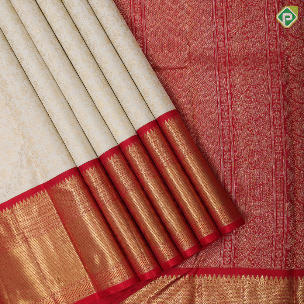 White gold zari small floral creeper grand design rani red gold zari multi design lines border Exclusive bridal silk saree