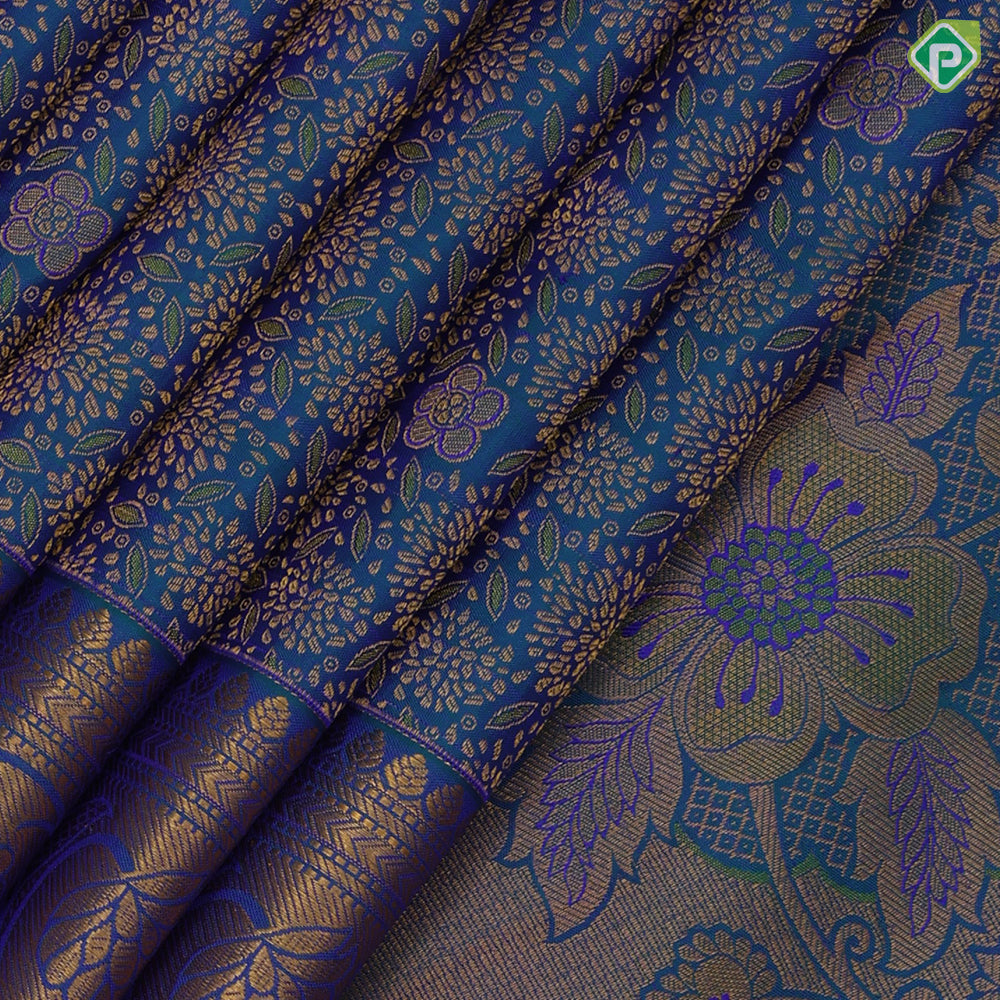 Peacock blue gold zari fancy flower meena work self gold zari rangoli border grand bridal silk saree