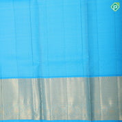 mango yellow gold zari grand floral design deep sky blue gold zari micro diamond border pattu paavadai thavani  3 in 1 set