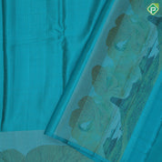 Jade green color nice texture matte finish nature scenery effect art work border signature edition silk saree