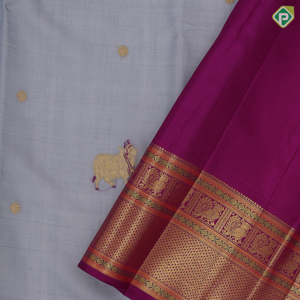 blueish grey gold zari thread work cow butta design contrast purple gold peacock butta mayilkan border pichwai silk saree