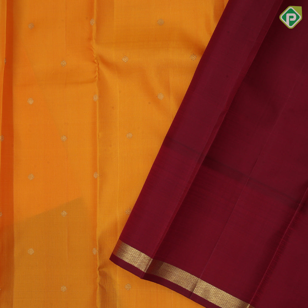 Mango yellow gold zari rudraksham butta design contrast maroon gold zari padded border traditional silk saree