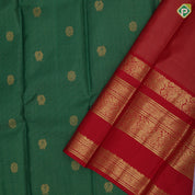 Forest green gold zari vairaoosi peacock chakkaram contrast red gold zari gaja yaali butta border traditional vintage silk saree
