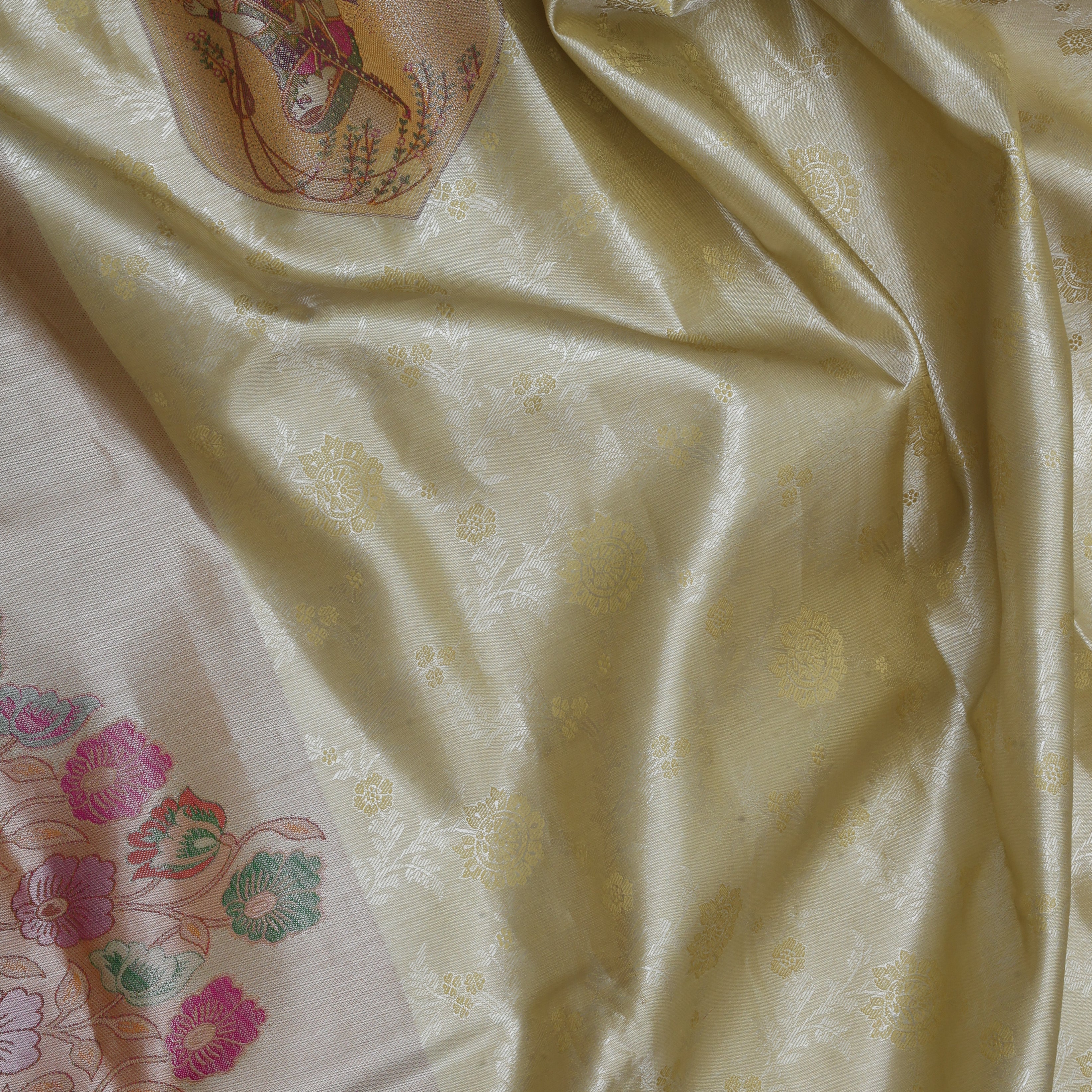 Banana yellow silver zari meera in arch design self silver zari rangoli floral design border tissue silk saree