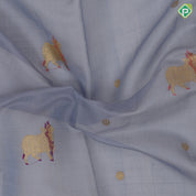 blueish grey gold zari thread work cow butta design contrast purple gold peacock butta mayilkan border pichwai silk saree