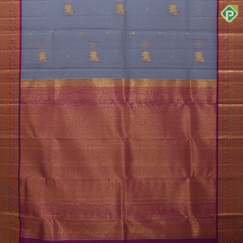 blueish grey gold zari thread work cow butta design contrast purple gold peacock butta mayilkan border pichwai silk saree