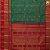 Forest green gold zari vairaoosi peacock chakkaram contrast red gold zari gaja yaali butta border traditional vintage silk saree