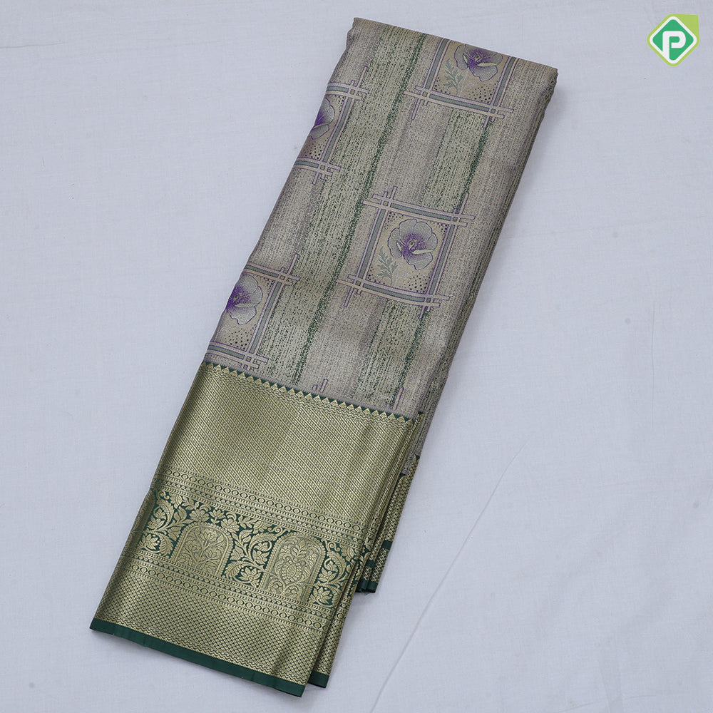 green base pastel red frame flower design self color gold zari grand border tissue art silk saree