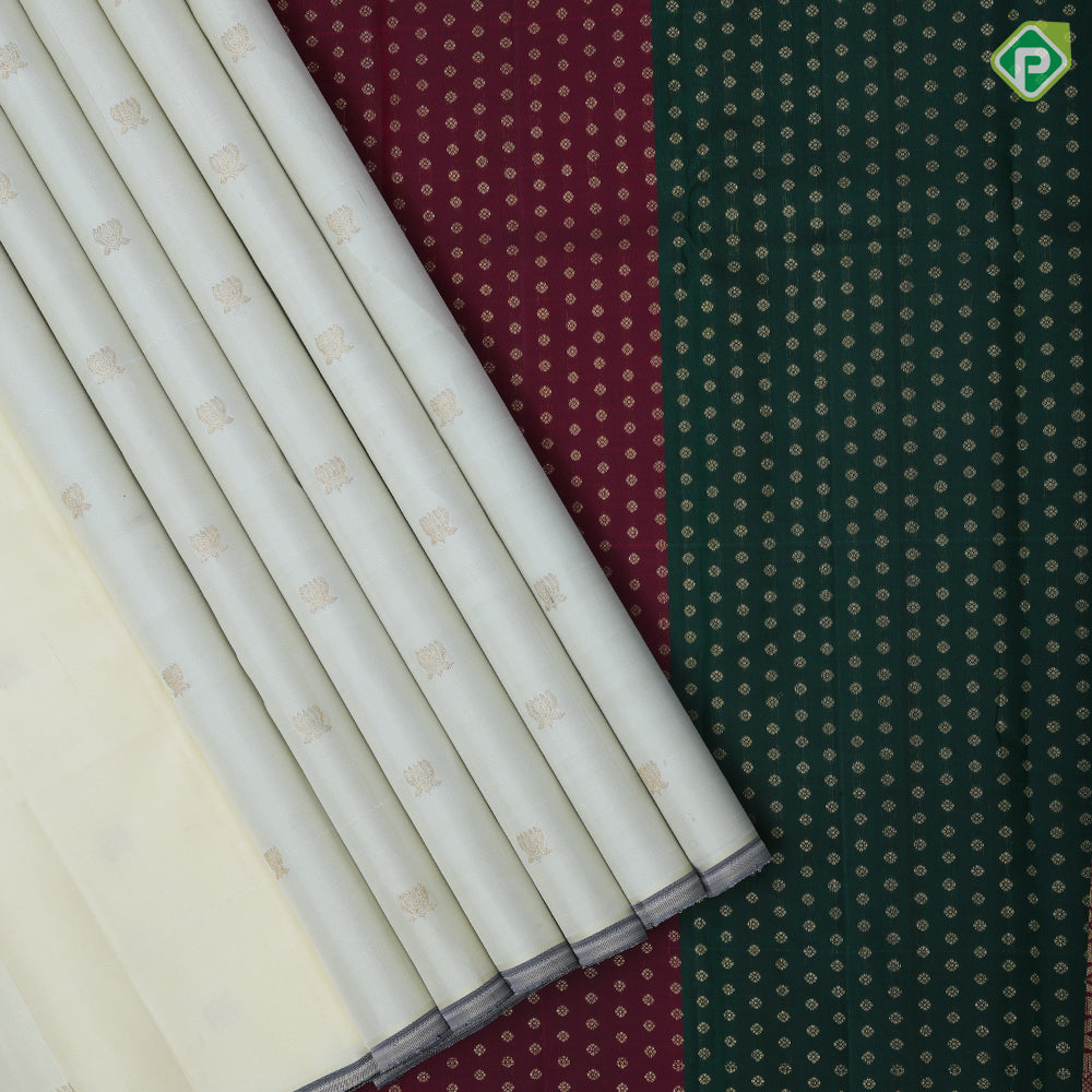 creamy yellow gold zari lotus butta full body design edge border trendy designer silk saree