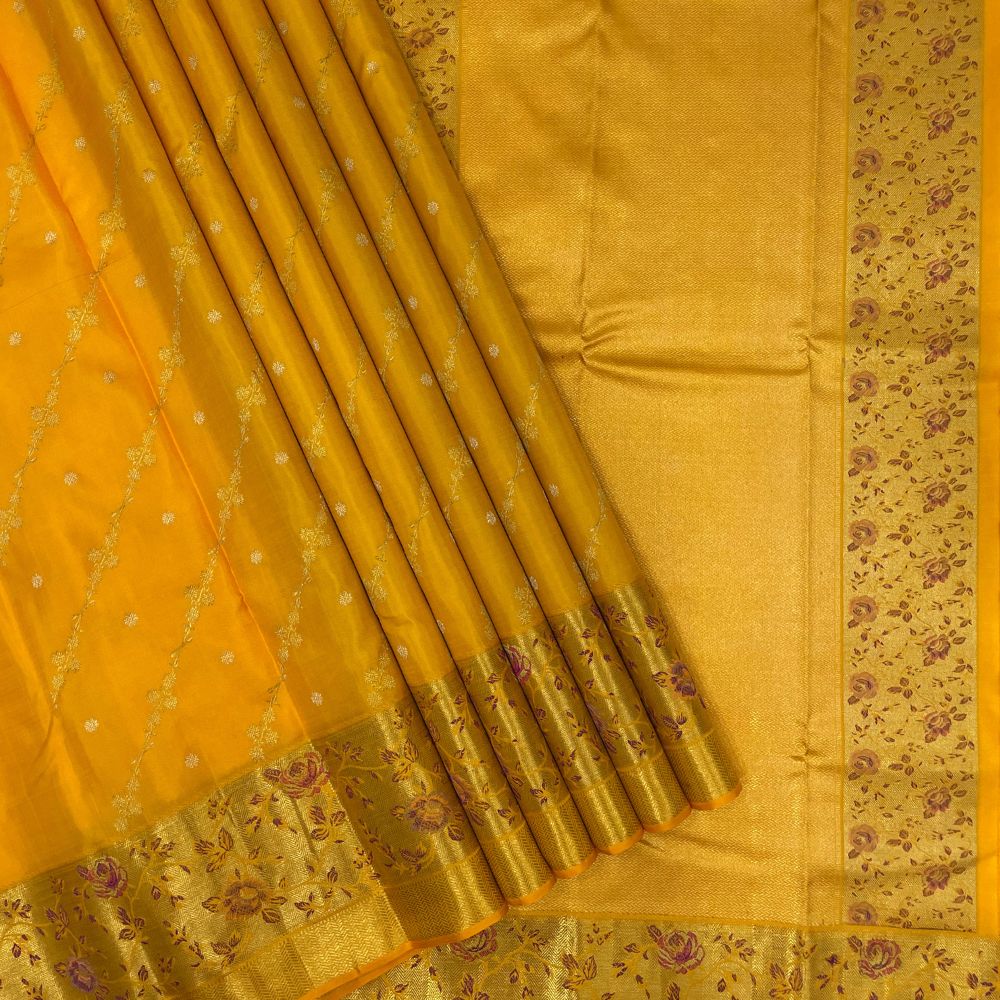 Orangish Yellow Silk Thread Pythonic Design Border Exclusive Grand Silk Saree