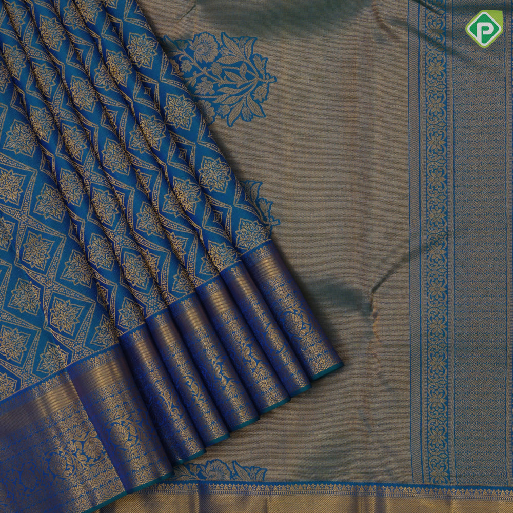 Peacock blue gold zari grand star diamond self gold zari rangoli border bridal silk saree