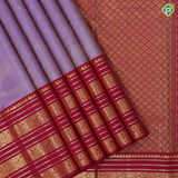 Lavender gold zari tissue star butta thread zig zag lines maroon gold zari peacock butta silver zari lines border traditional silk saree