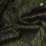 Forest green gold zari chakram grand butta design contrast red pythanic border grand bridal silk saree