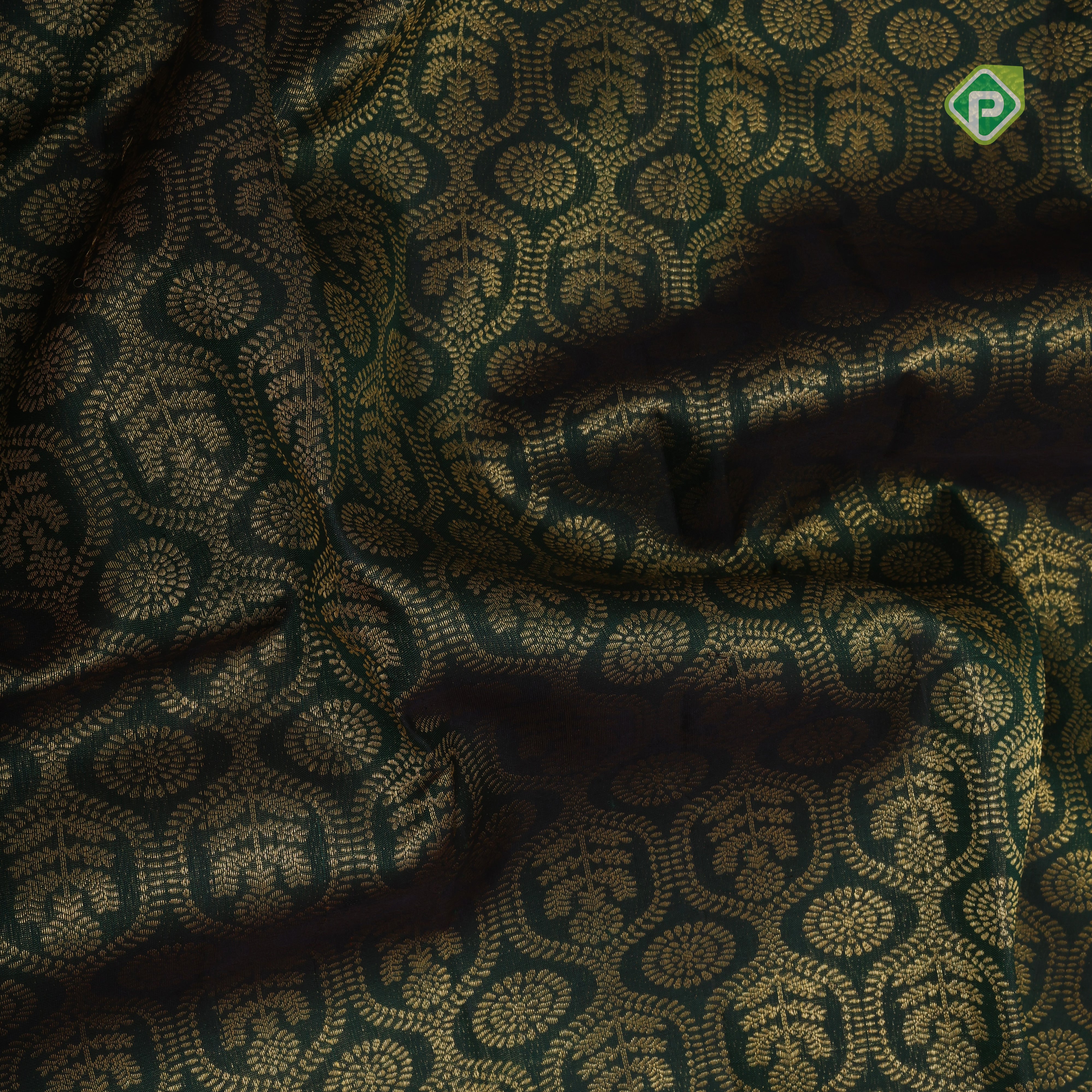 Forest green gold zari chakram grand butta design contrast red pythanic border grand bridal silk saree