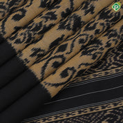 golden base black ikkat design black plain border ikkat design silk saree
