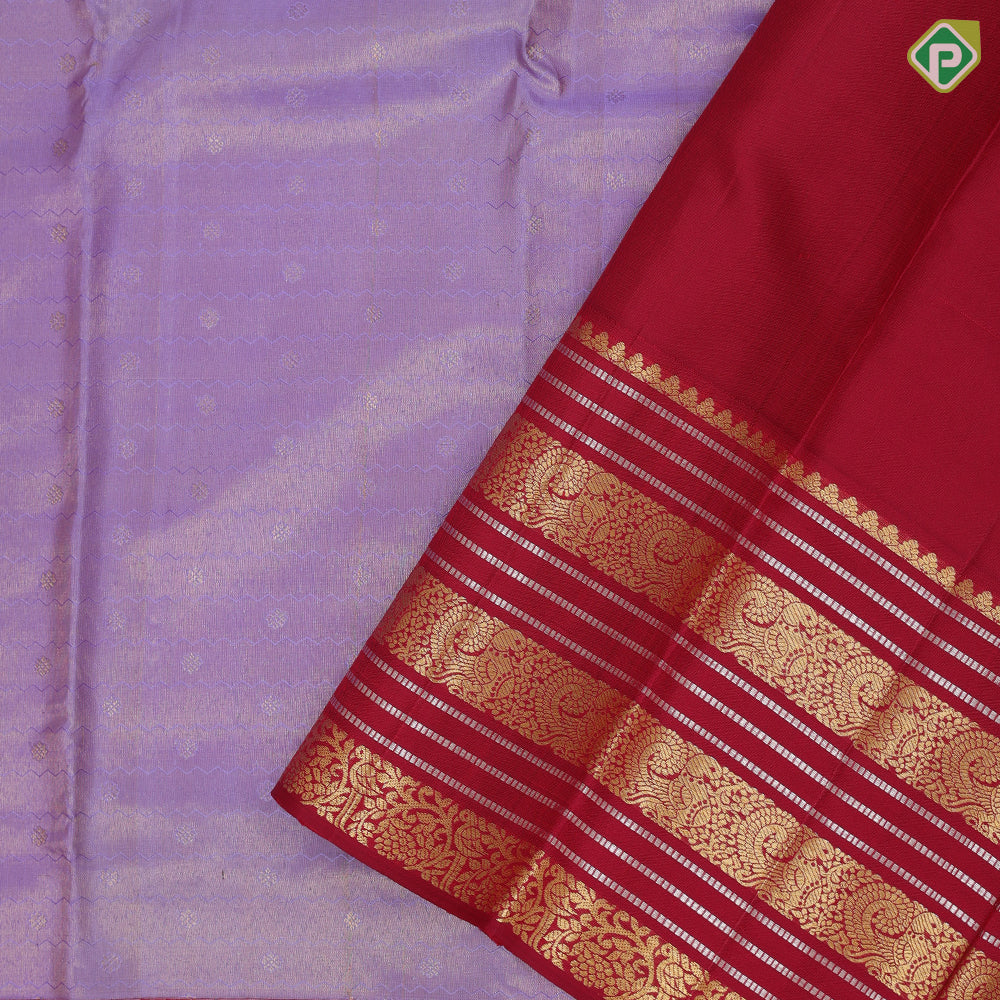 Lavender gold zari tissue star butta thread zig zag lines maroon gold zari peacock butta silver zari lines border traditional silk saree