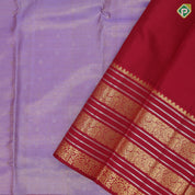 Lavender gold zari tissue star butta thread zig zag lines maroon gold zari peacock butta silver zari lines border traditional silk saree