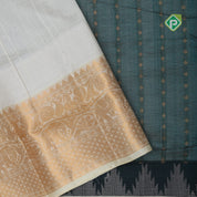 Peacock blue gold zari lines thilagam buttas design milk cream gold zari border silk cotton saree