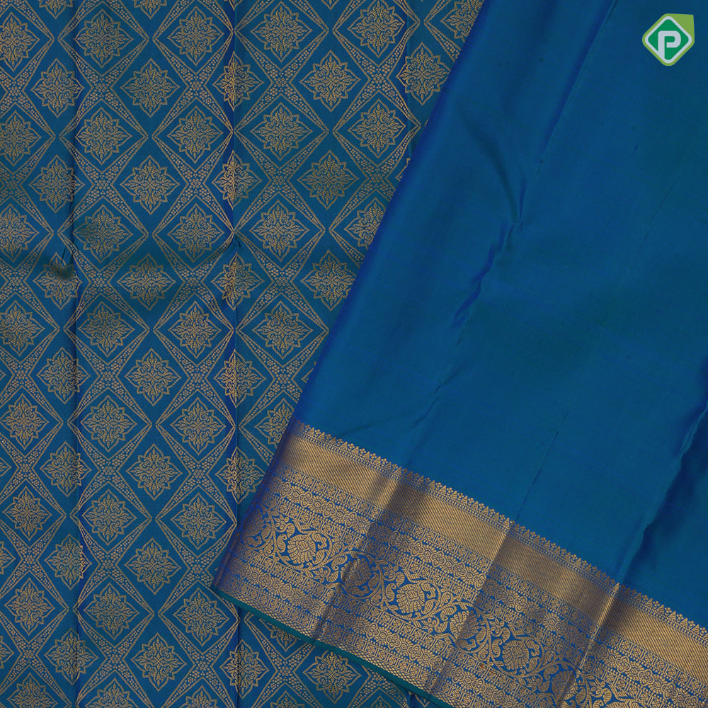Peacock blue gold zari grand star diamond self gold zari rangoli border bridal silk saree