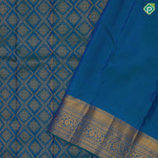 Peacock blue gold zari grand star diamond self gold zari rangoli border bridal silk saree
