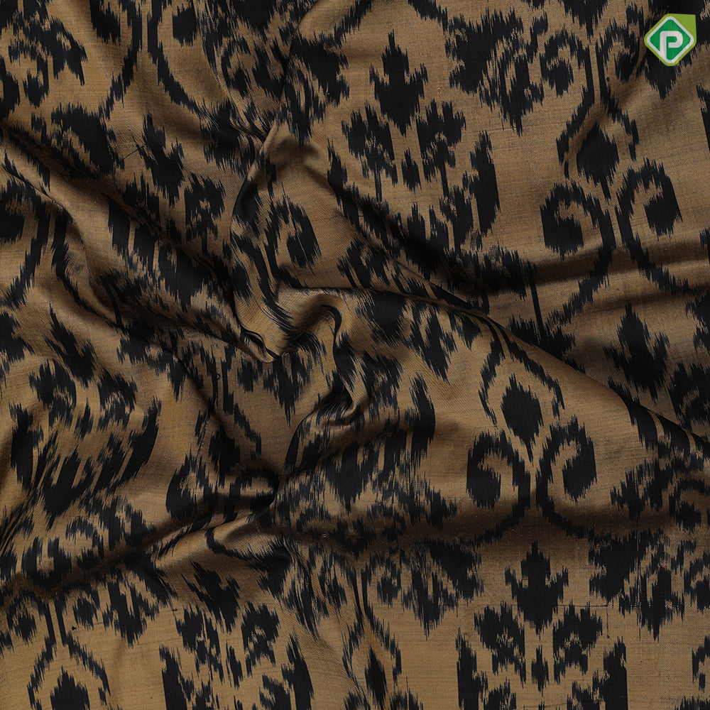 golden base black ikkat design black plain border ikkat design silk saree