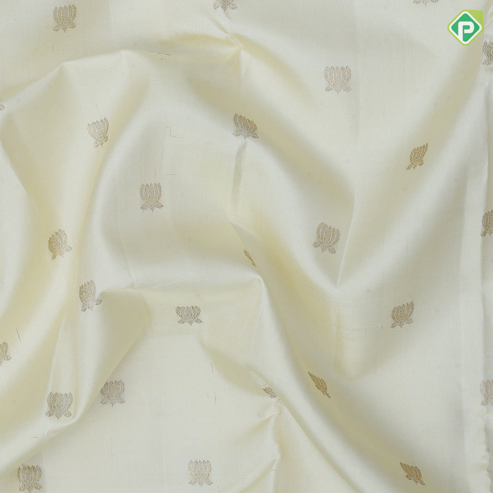 creamy yellow gold zari lotus butta full body design edge border trendy designer silk saree